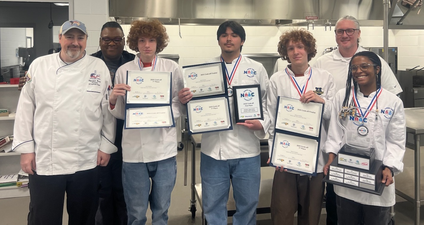 Northern High School team members show their culinary awards.